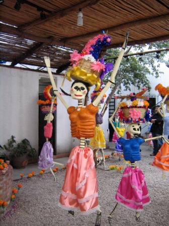 Paper mache puppets and sculpture in Muertos display.